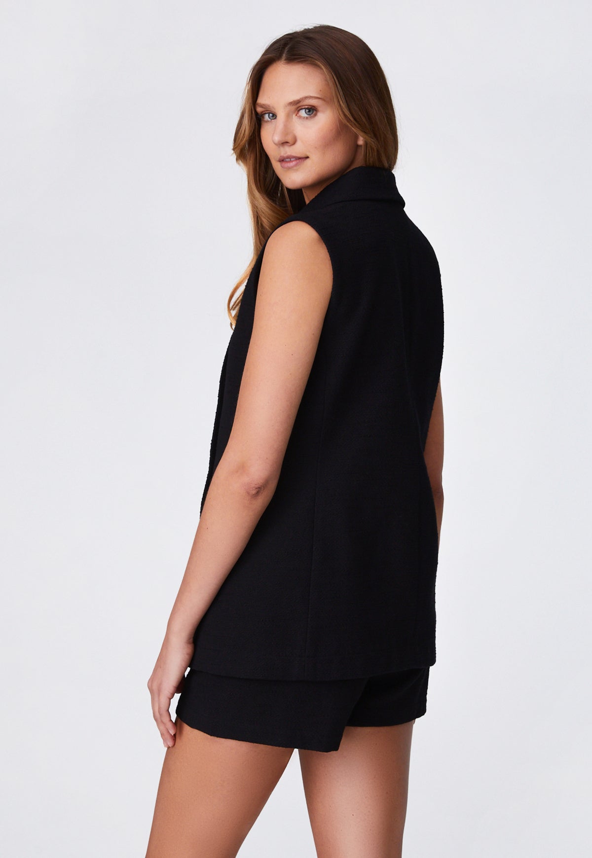 THE DOUBLE BREASTED SLEEVELESS JACKET in BLACK TEXTURED COTTON