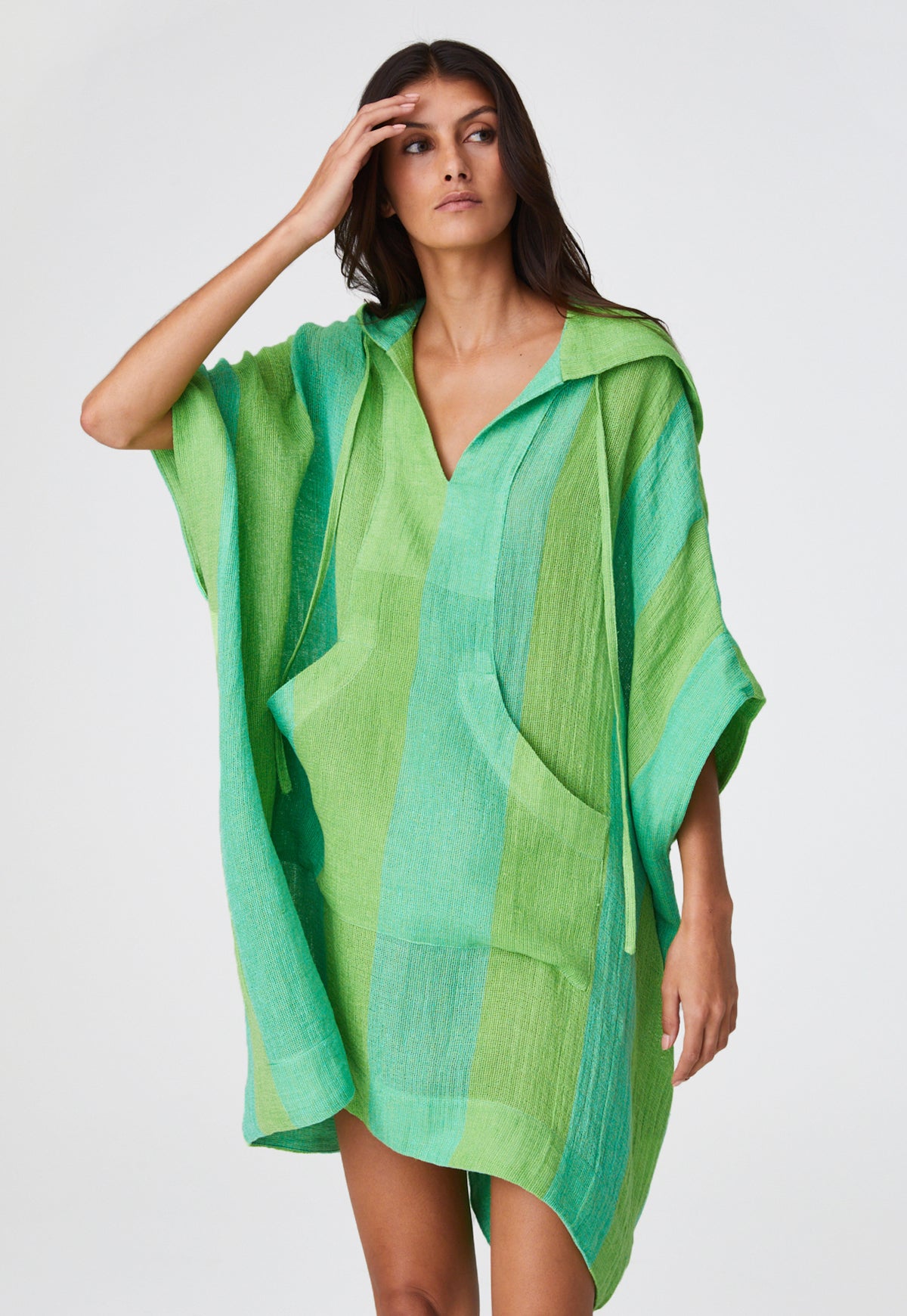 THE HOODED PONCHO in GUAVA AWNING STRIPED GAUZE